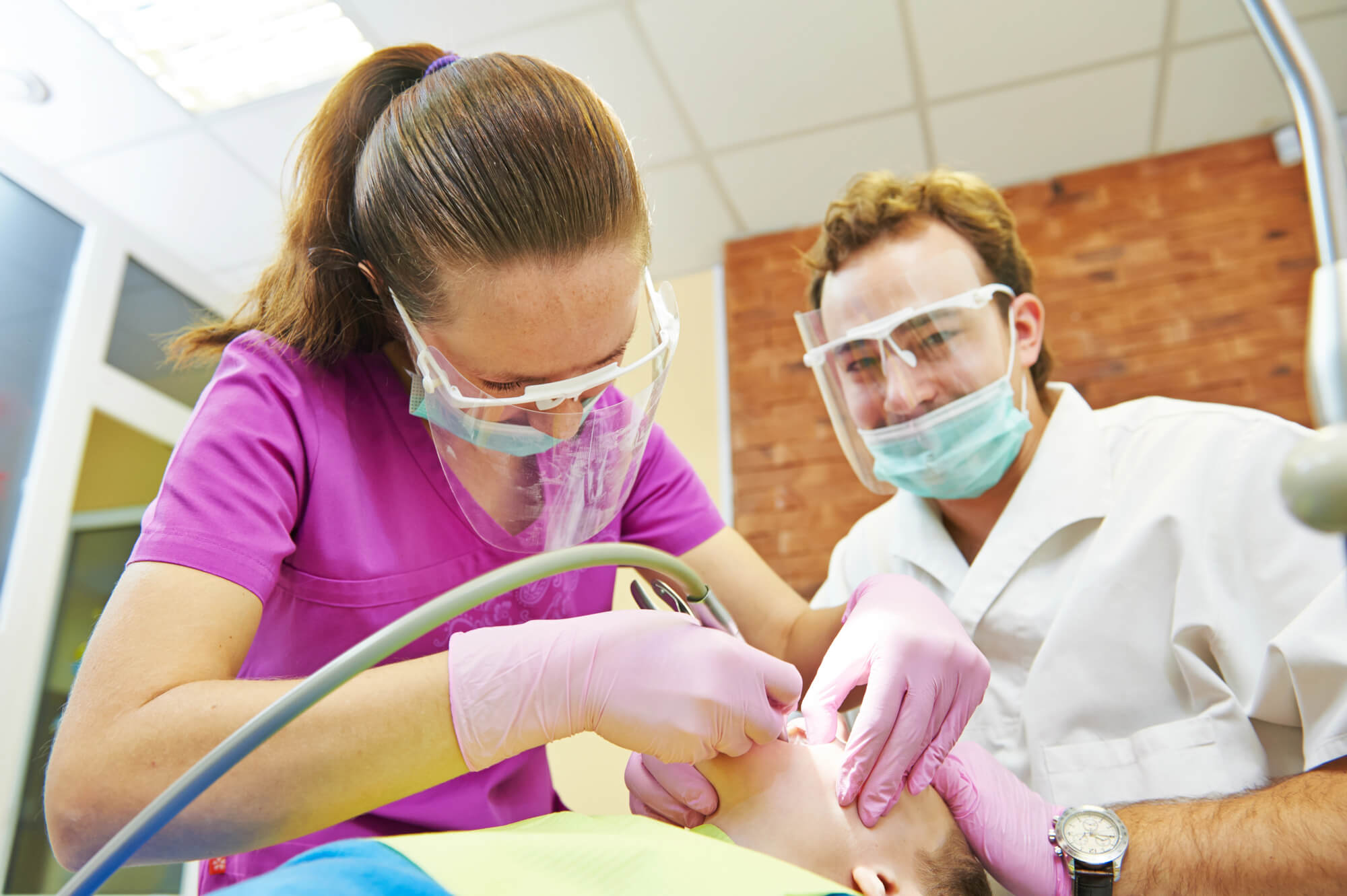 sedation dentist Las Vegas performs dental procedure